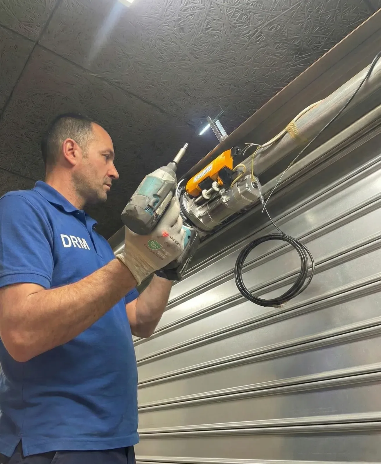 Motorisation de rideau métallique à Colombes